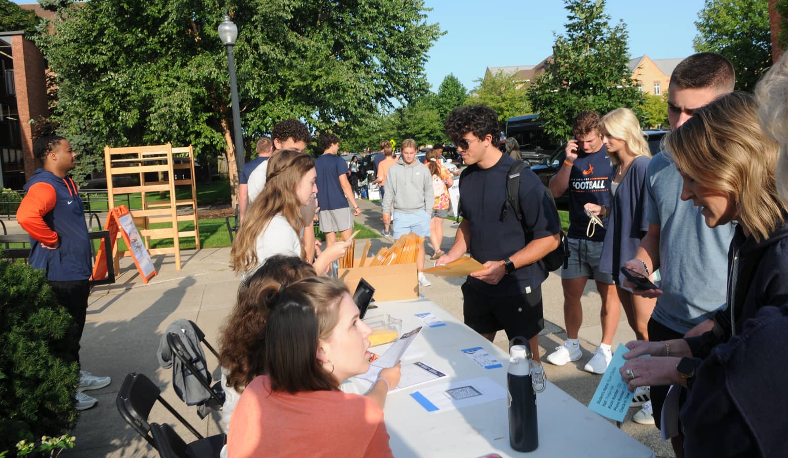 Hope families and students outside a residence hall during move-in day