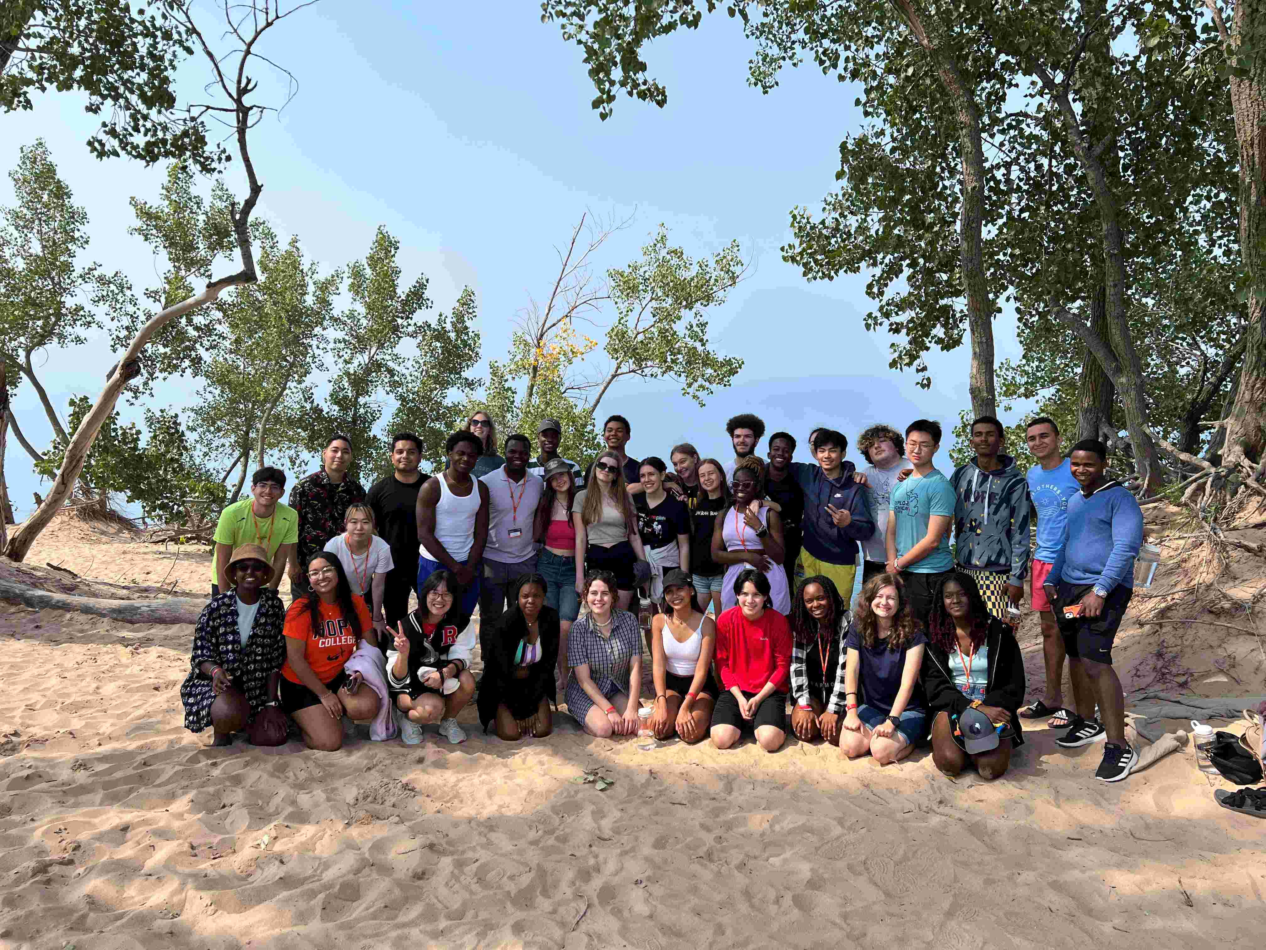 SleepingBearDunes2023ExploreMI Group photo of international and third culture kid freshmen students at the Sleeping Bear Dunes overlooking Lake Michigan