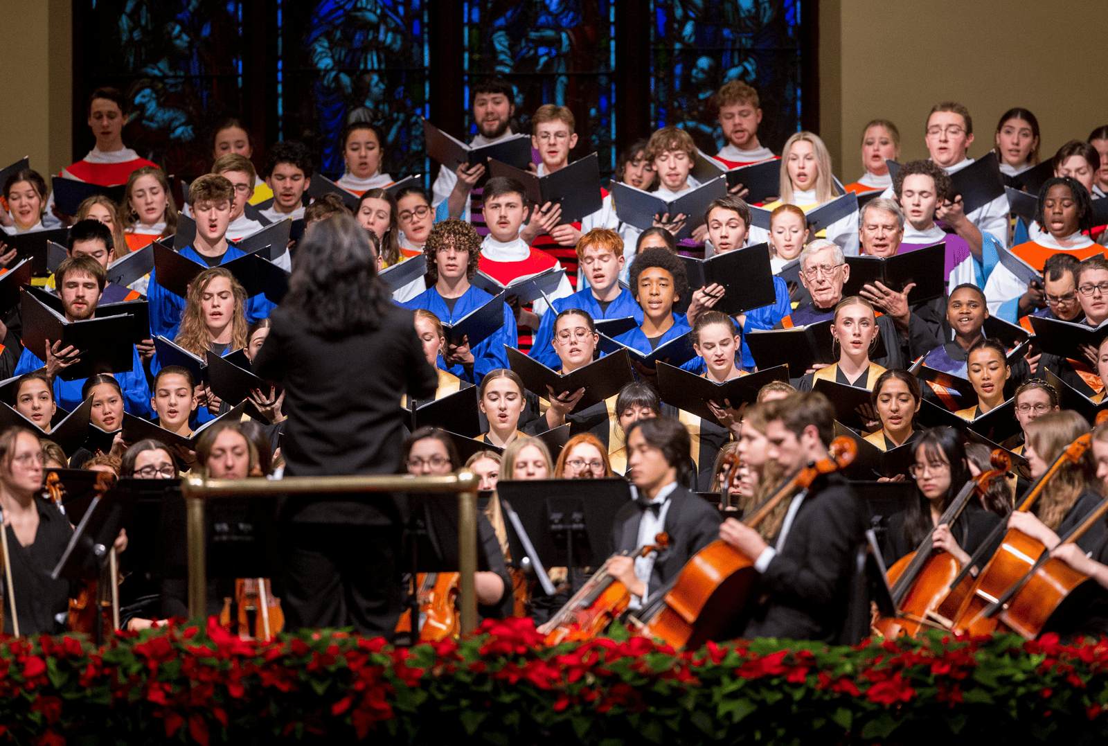 A Hope College choral ensemble performing onstage
