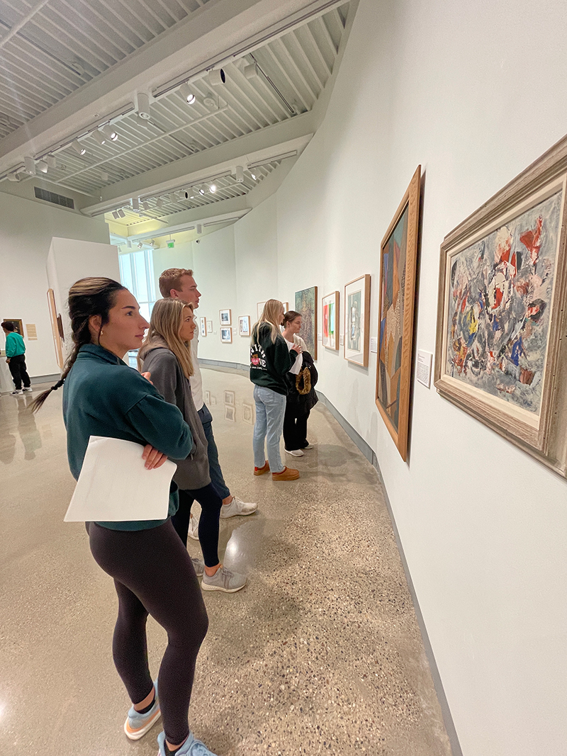 Hope College students viewing artworks at the Kruizenga Art Museum