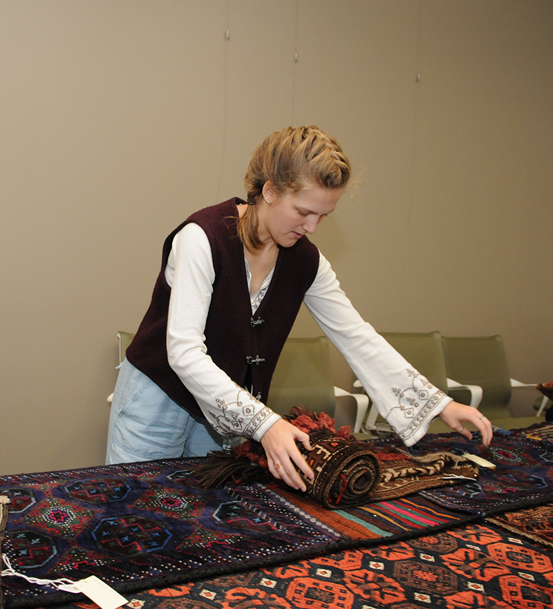 Hope College 2018 John H. Dryfhout ’64 Intern working with Baluch textiles at the KAM