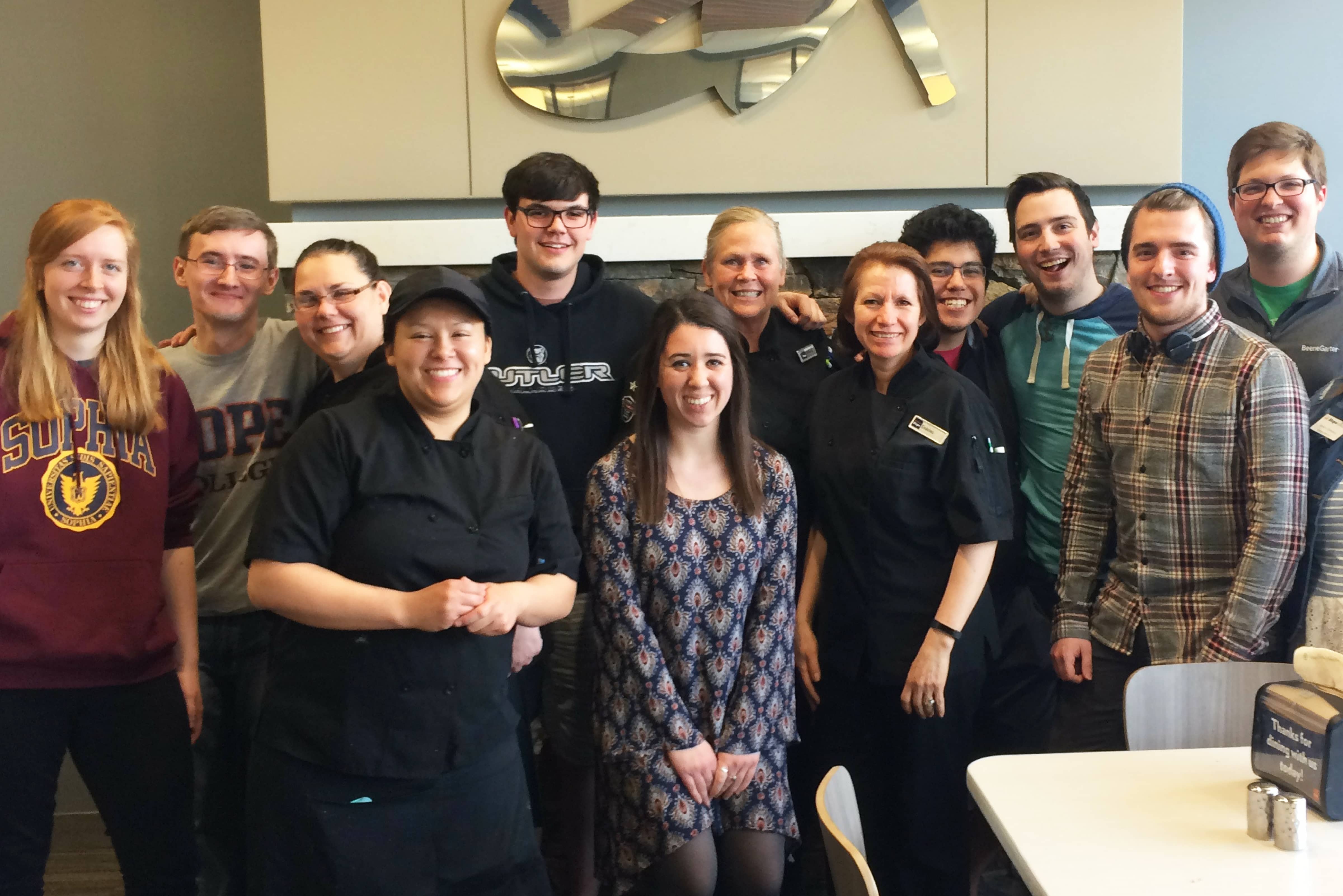 Team members smiling together