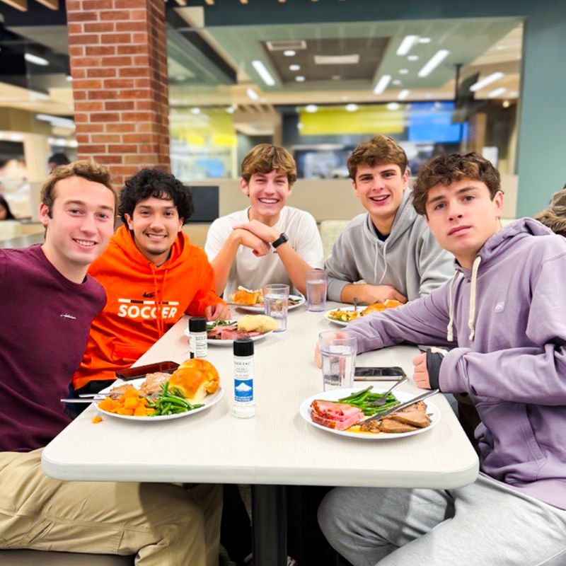 Student at a dining table